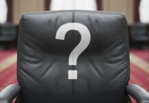 a black chair with a question mark on it