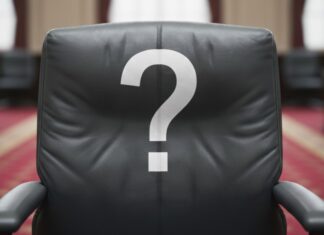 a black chair with a question mark on it