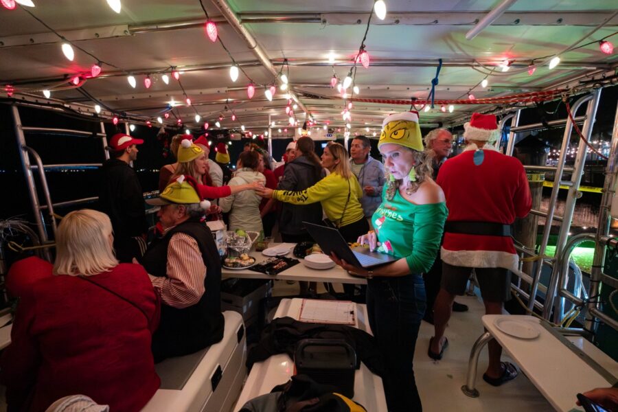 a group of people in costumes on a boat