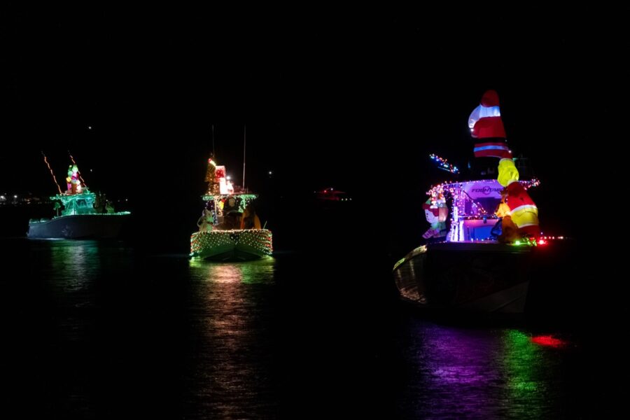 a group of boats that are floating in the water