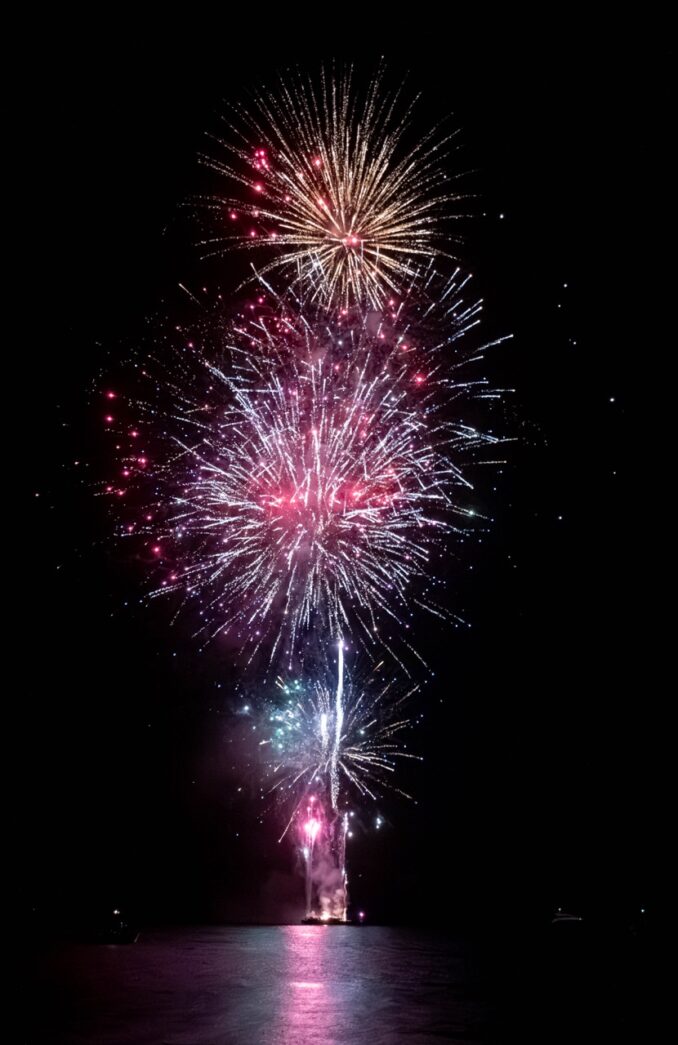 a colorful fireworks display in the night sky