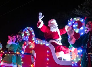a group of people riding on top of a float