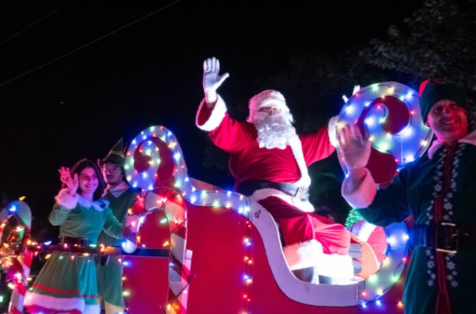 a group of people riding on top of a float