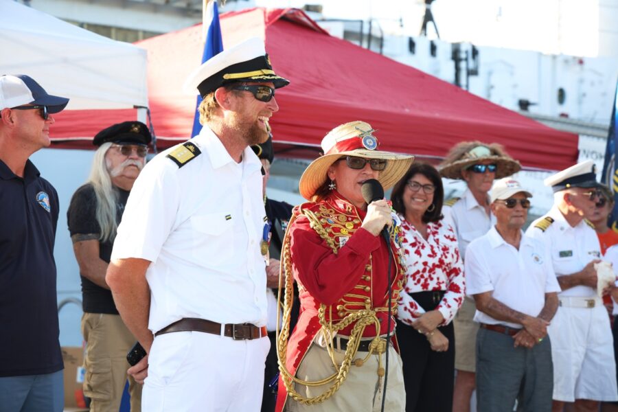 a group of people standing next to each other