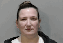 a woman is shown in this mug shot