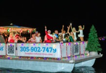 a group of people on a boat in the water