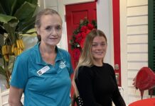 a couple of women standing next to each other