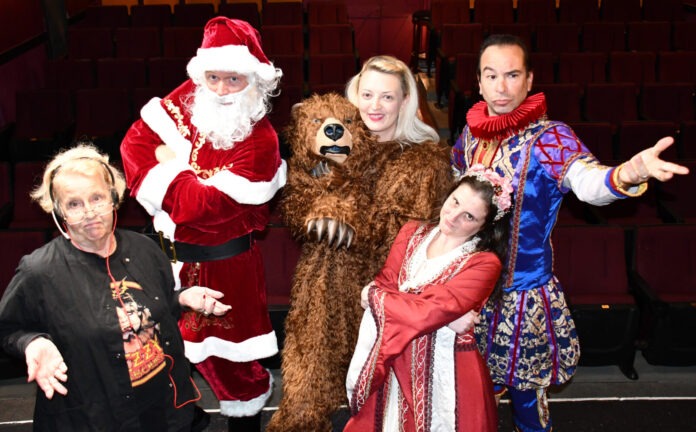 a group of people dressed up as santa claus