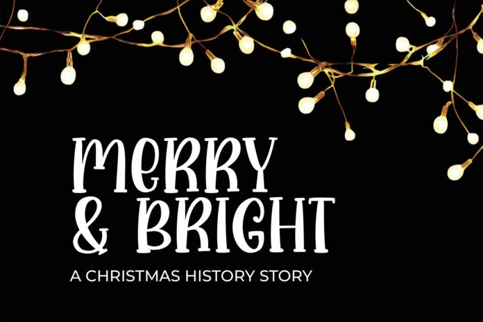 a christmas story with lights on a black background