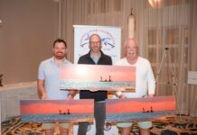 a group of men standing next to each other