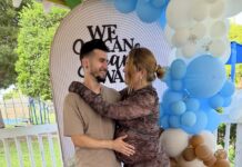 ‘HAVE YOU SUFFERED ENOUGH YET?’ MARATHON MOTHER GIVES BIRTH ALONE AFTER ICE DETAINS HER HUSBAND a man and a woman are hugging under a balloon arch