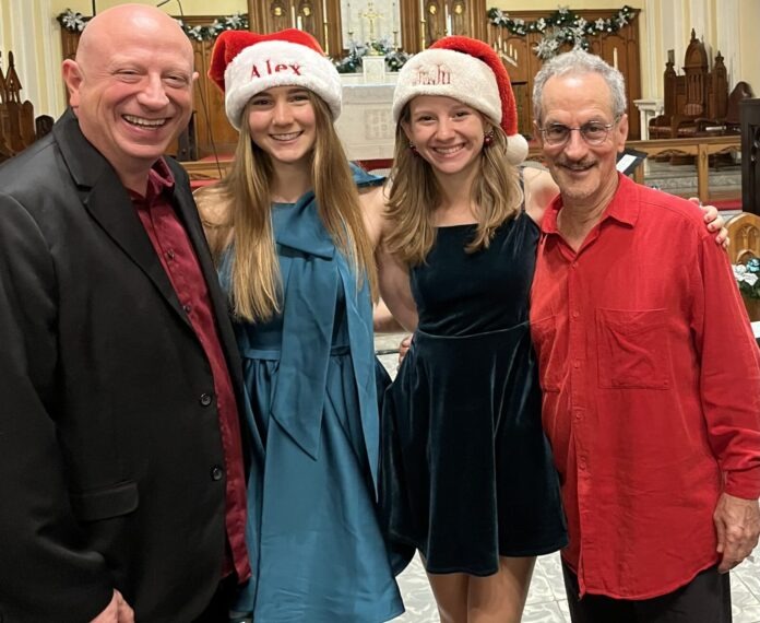 a group of people standing next to each other