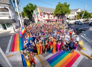 a large group of people standing on a street