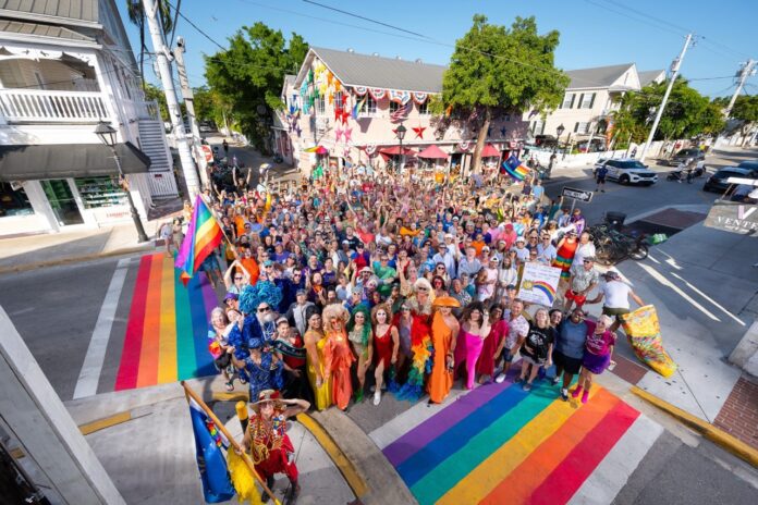 a large group of people standing on a street
