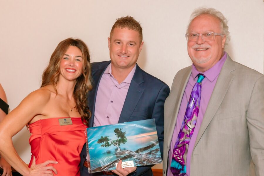 a group of people standing next to each other