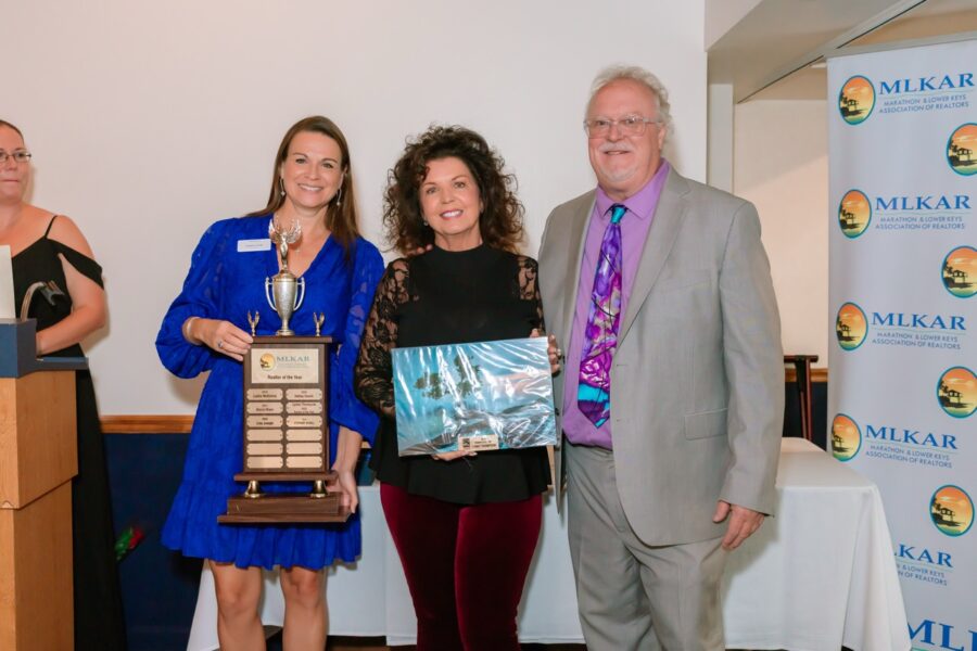 a group of people standing next to each other