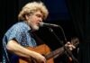 MAC McANALLY & NICK NORMAN SELL OUT KEY WEST THEATER a man with a beard playing a guitar