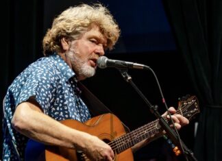 MAC McANALLY & NICK NORMAN SELL OUT KEY WEST THEATER a man with a beard playing a guitar