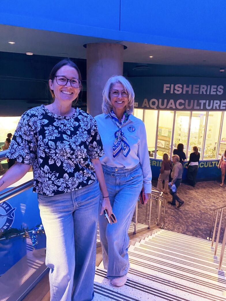 a couple of women standing next to each other