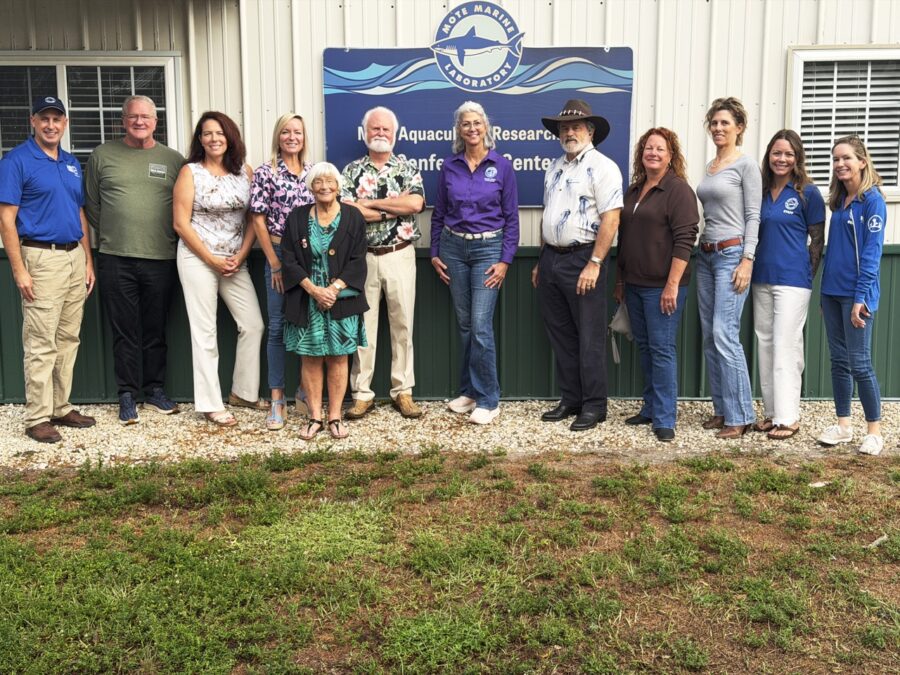 a group of people standing in front of a building