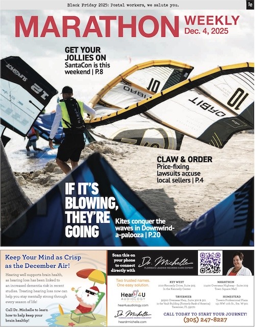 a magazine cover with a man holding a surfboard