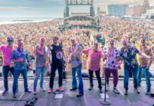 BEACH BOYS BRING ‘SOUNDS OF SUMMER’ TOUR TO KEY WEST a group of people standing on top of a stage