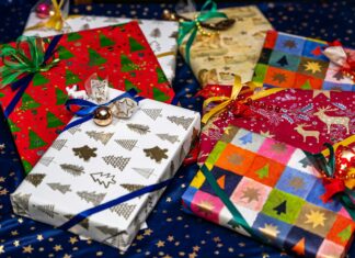 a group of wrapped presents sitting on top of a table