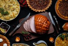 THE EVOLUTION OF HOLIDAY FOOD (AND WHY OUR GUTS ARE CRYING ABOUT IT) a table topped with lots of different types of pies