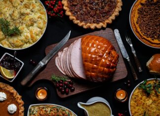 a table topped with lots of different types of pies