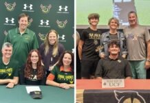CORAL SHORES’ SMITH, KEY WEST’S MERCER TAKE THEIR TALENTS TO THE NEXT LEVEL a group of people standing around a table