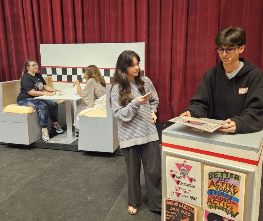 a couple of people standing next to each other