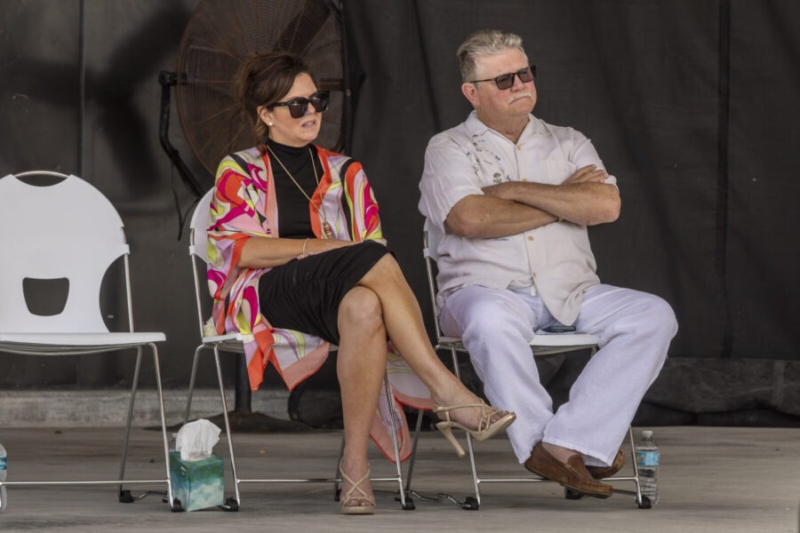 a man and a woman sitting in chairs