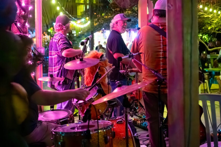 a group of people that are playing drums