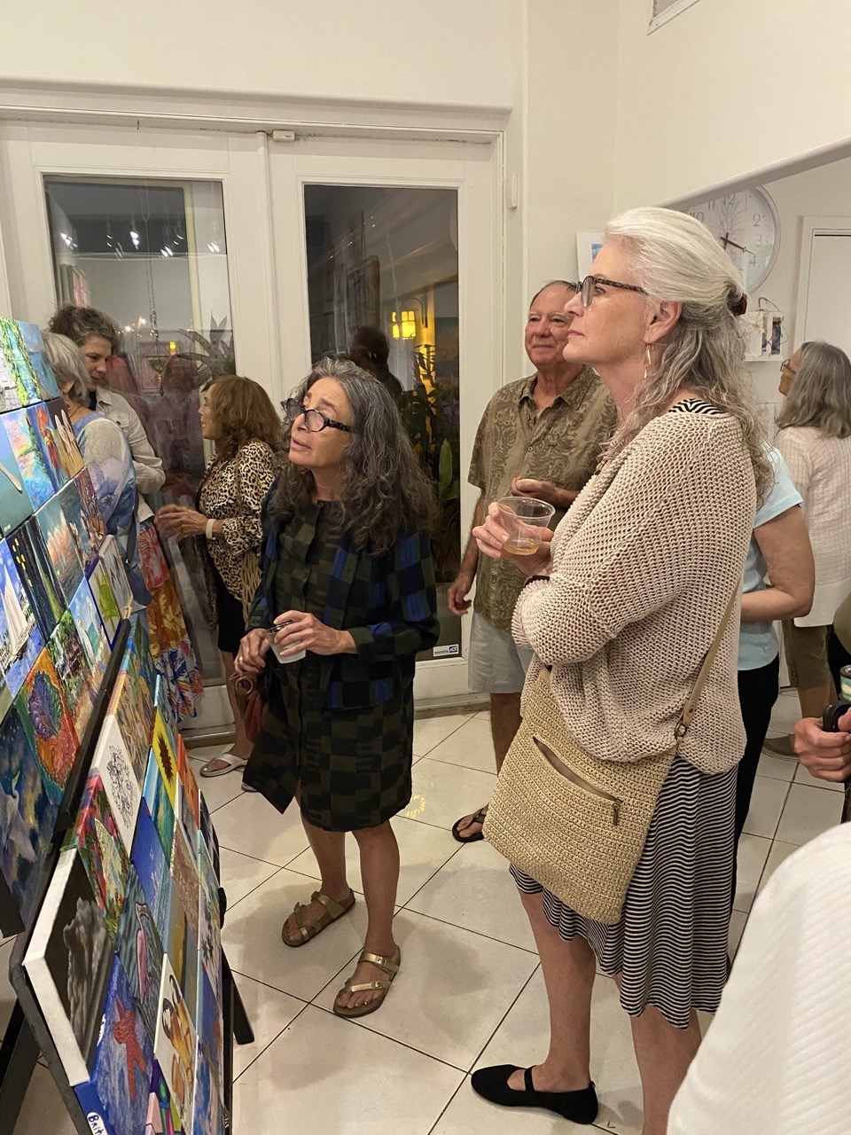 a group of people standing in a room