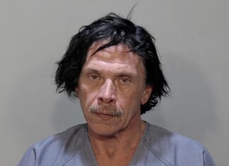 KEY WEST MAN ACCUSED OF HITTING ANOTHER MAN WITH BAGS CONTAINING BEER BOTTLES a mug shot of a man with black hair