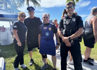 KCB WELCOMES RESIDENTS BACK WITH SUNSET PARK CONCERT & COOKOUT a group of people standing next to each other
