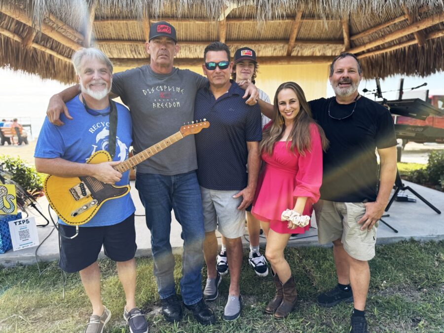 a group of people standing next to each other