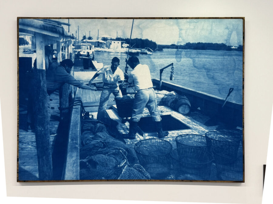 a couple of people sitting on a boat in the water