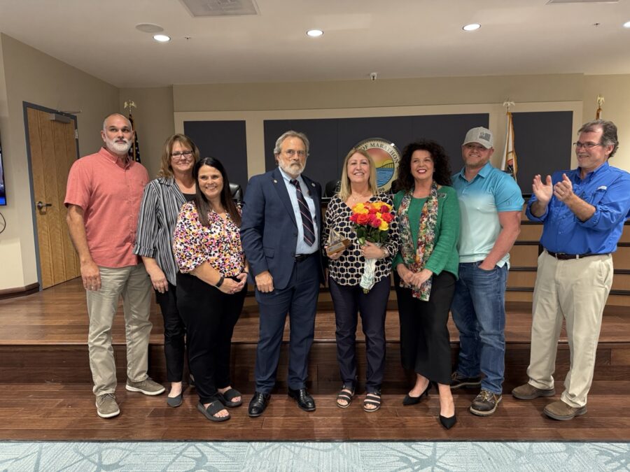 a group of people standing on a stage