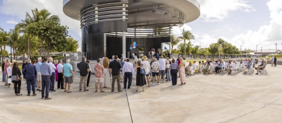 a group of people standing in front of a building