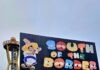 a large sign that says south of the border