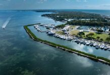 an aerial view of a marina in the middle of the ocean