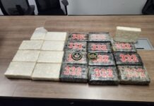 a table topped with lots of bags of food