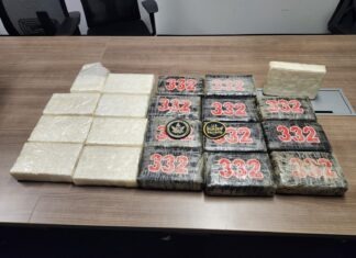 MORE THAN 20 KILOS OF COCAINE SEIZED FROM MARATHON CHARTER CAPTAIN a table topped with lots of bags of food