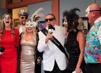 a group of people standing next to each other