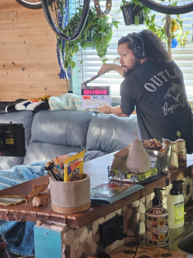 a man sitting on a couch in a living room
