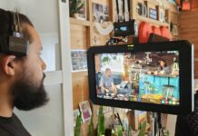 FILM CREW IS SHOOTING A MOVIE IN KEY WEST THIS MONTH a man with a beard is looking at a video camera