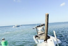 FWC: BOAT HIT SUBMERGED PILING OFF TAVERNIER BEFORE EJECTING FOUR