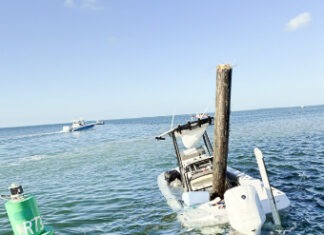 FWC: BOAT HIT SUBMERGED PILING OFF TAVERNIER BEFORE EJECTING FOUR