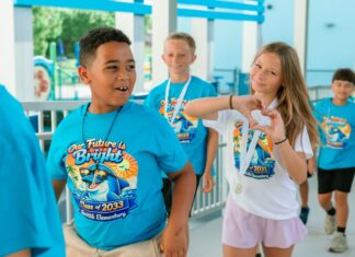 IN PICTURES: DOLPHINS SWIM ON AFTER SWITLIK MOVING UP CEREMONY